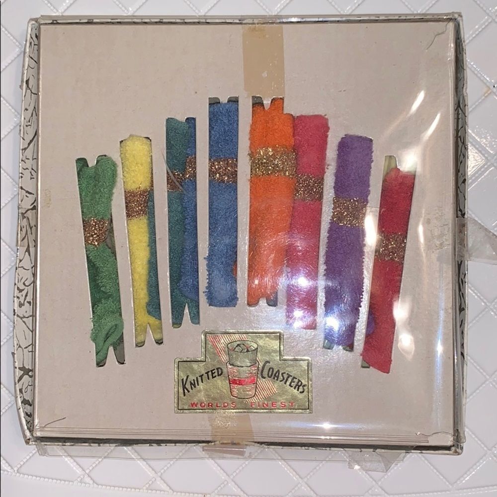 Vtg new in box 60s knitted coasters /gold bands